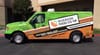 A photo of a delivery van for the Riverside Food Co-op.